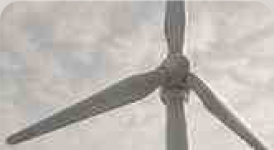 A wind turbine in soft daylight